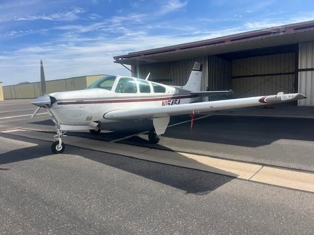 Exterior view of a 1990 BEECHCRAFT F33A BONANZA, N15454.