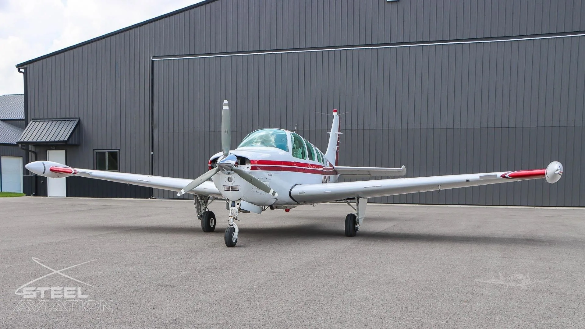 Exterior view of a 1997 BEECHCRAFT A36 BONANZA, N6784S.