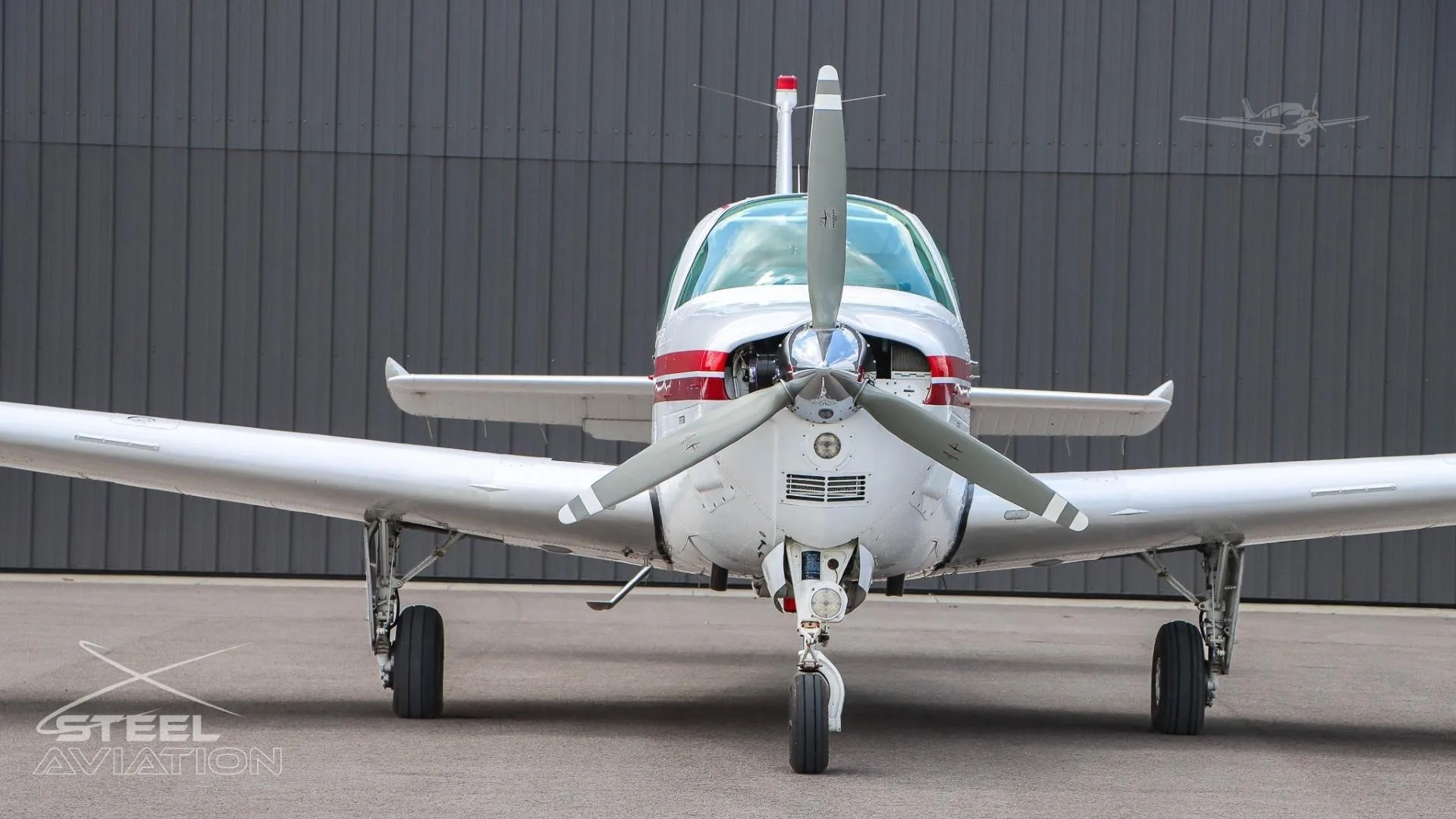 Exterior view of a 1997 BEECHCRAFT A36 BONANZA, N6784S.