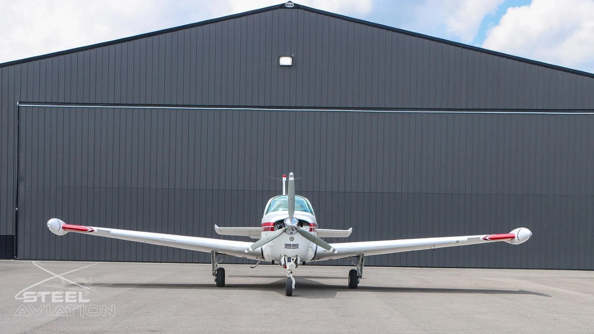 Exterior view of a 1997 BEECHCRAFT A36 BONANZA, N6784S.