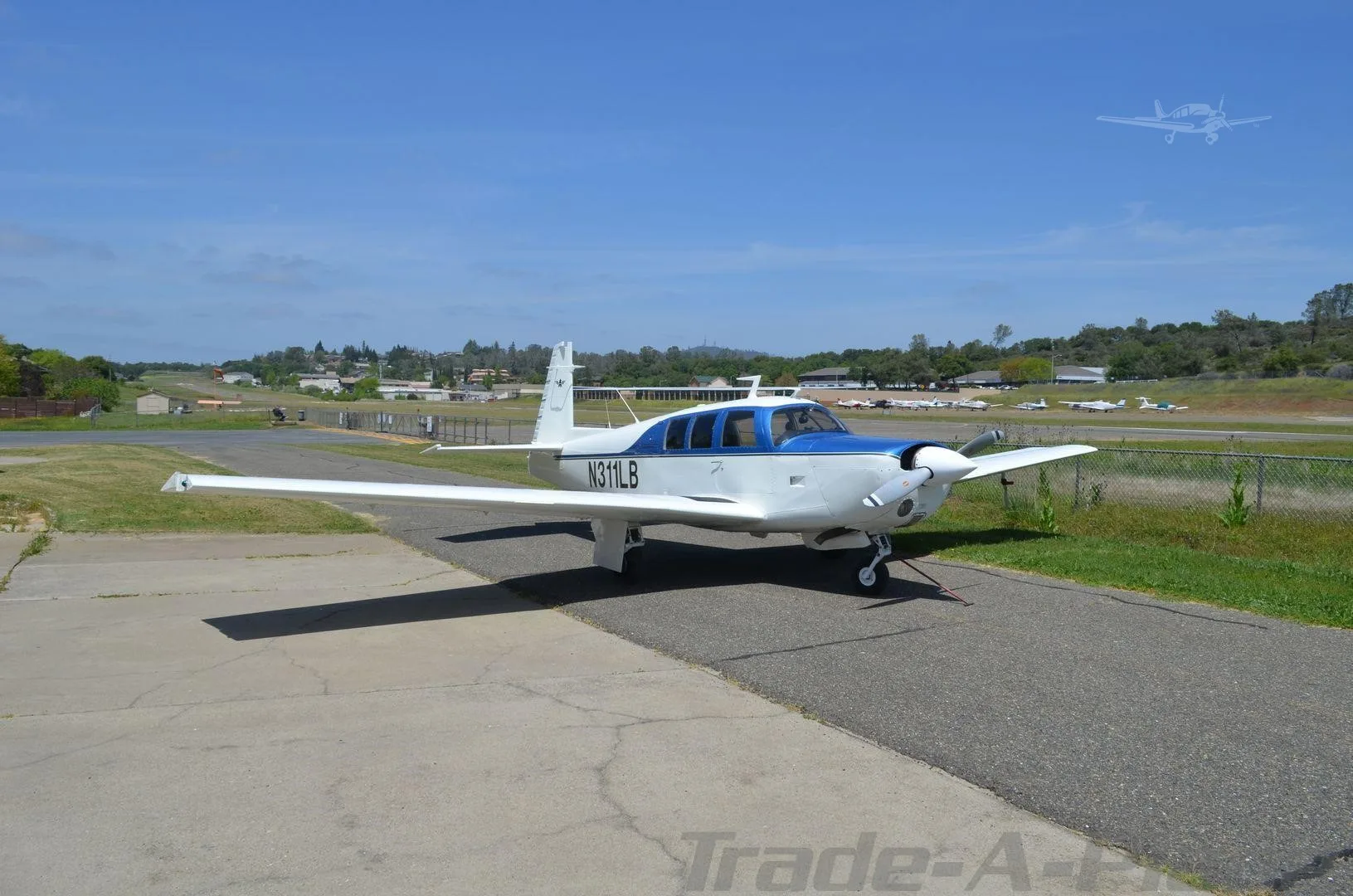 Exterior view of a 1970 MOONEY M20F EXEC 21, N311LB.