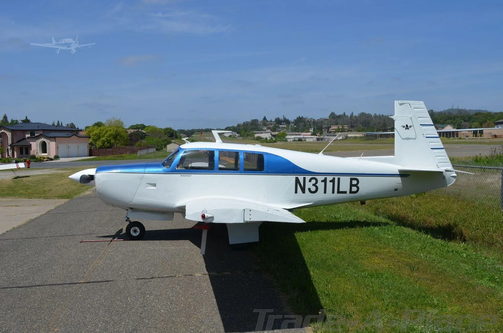 Exterior view of a 1970 MOONEY M20F EXEC 21, N311LB.