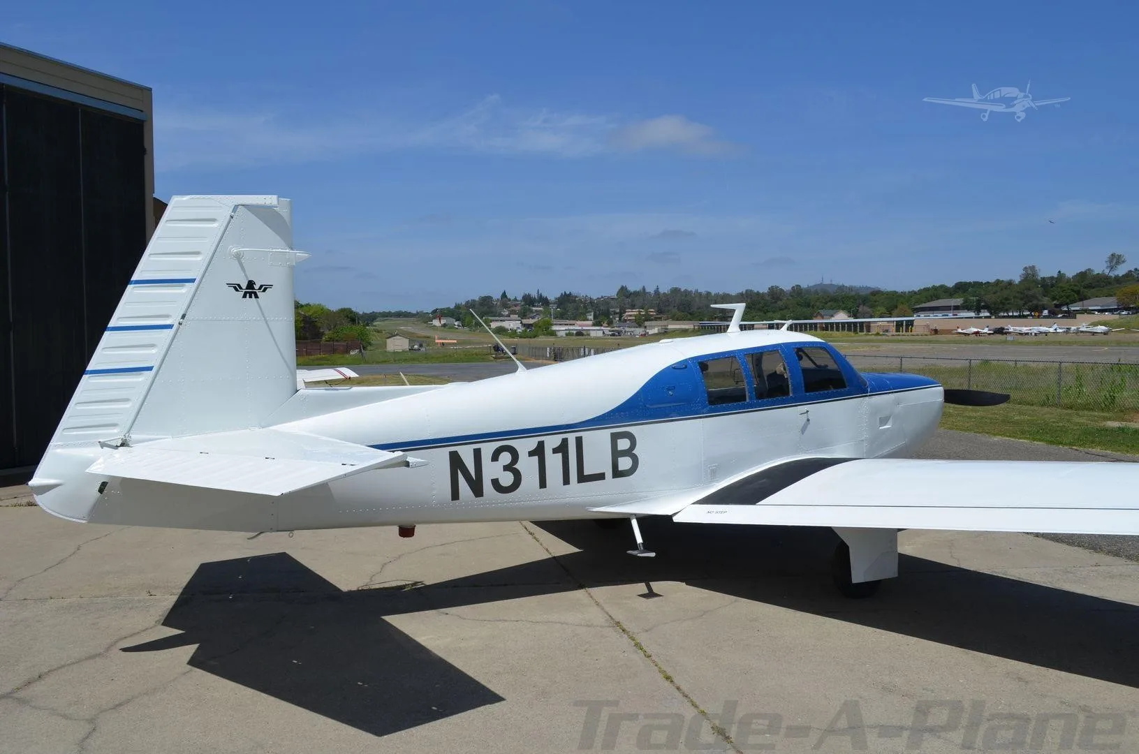 Exterior view of a 1970 MOONEY M20F EXEC 21, N311LB.