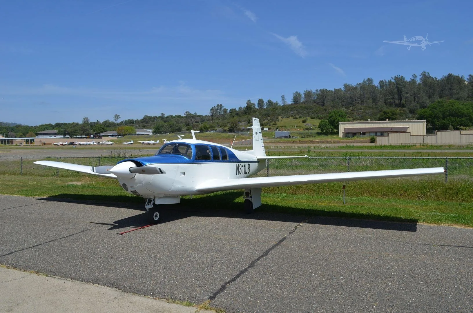 Exterior view of a 1970 MOONEY M20F EXEC 21, N311LB.