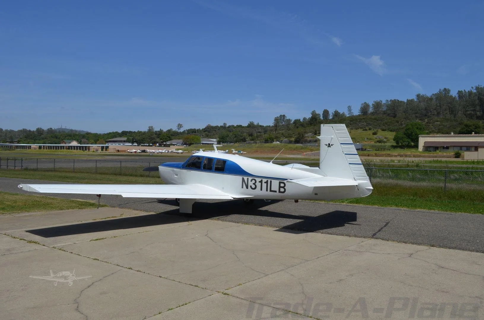Exterior view of a 1970 MOONEY M20F EXEC 21, N311LB.