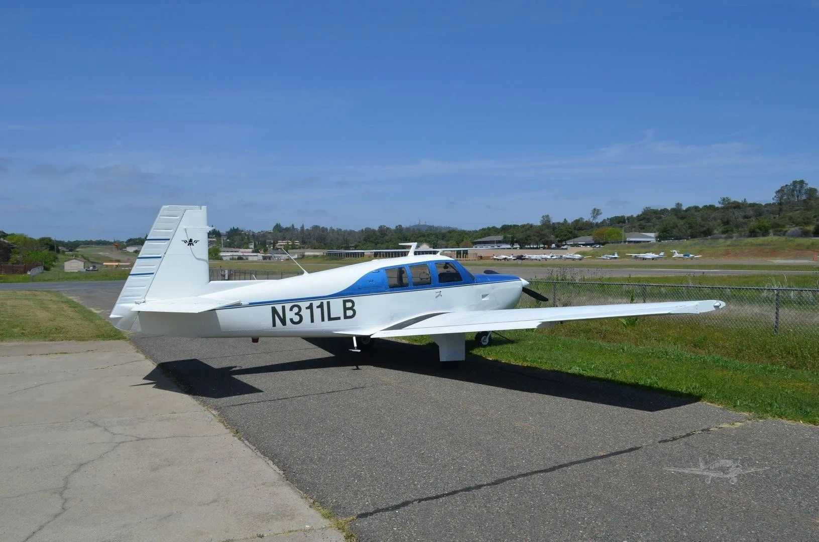 Exterior view of a 1970 MOONEY M20F EXEC 21, N311LB.