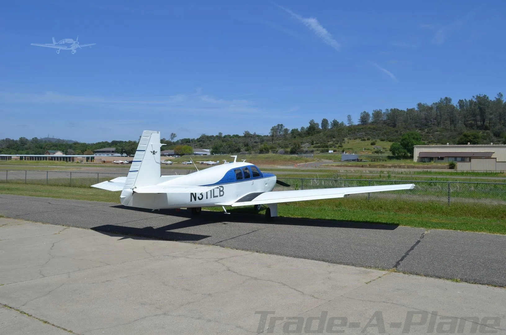Exterior view of a 1970 MOONEY M20F EXEC 21, N311LB.