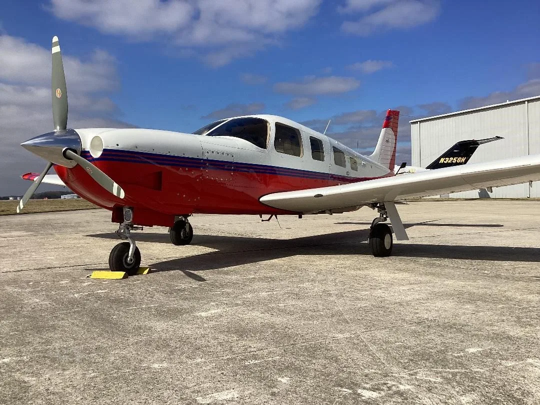 Exterior view of a 2003 PIPER SARATOGA II HP, N637JD.