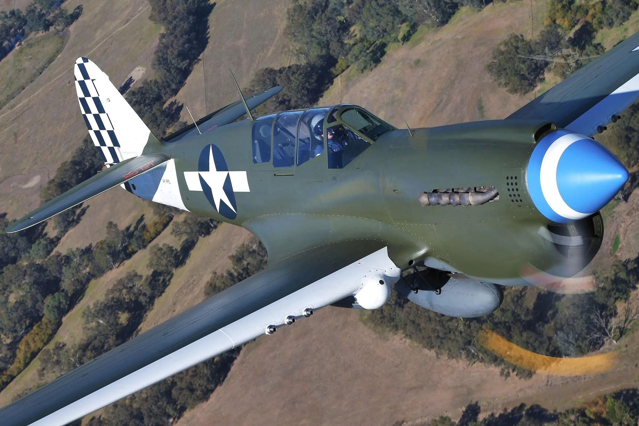 Marketing image of a 1943 CURTISS P-40N KITTYHAWK.