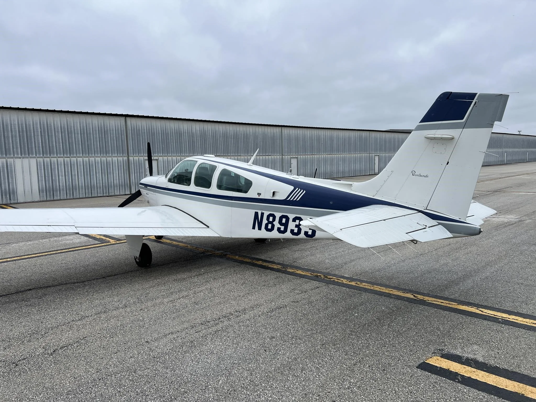 Exterior view of a 1989 BEECHCRAFT F33A BONANZA, N8933.