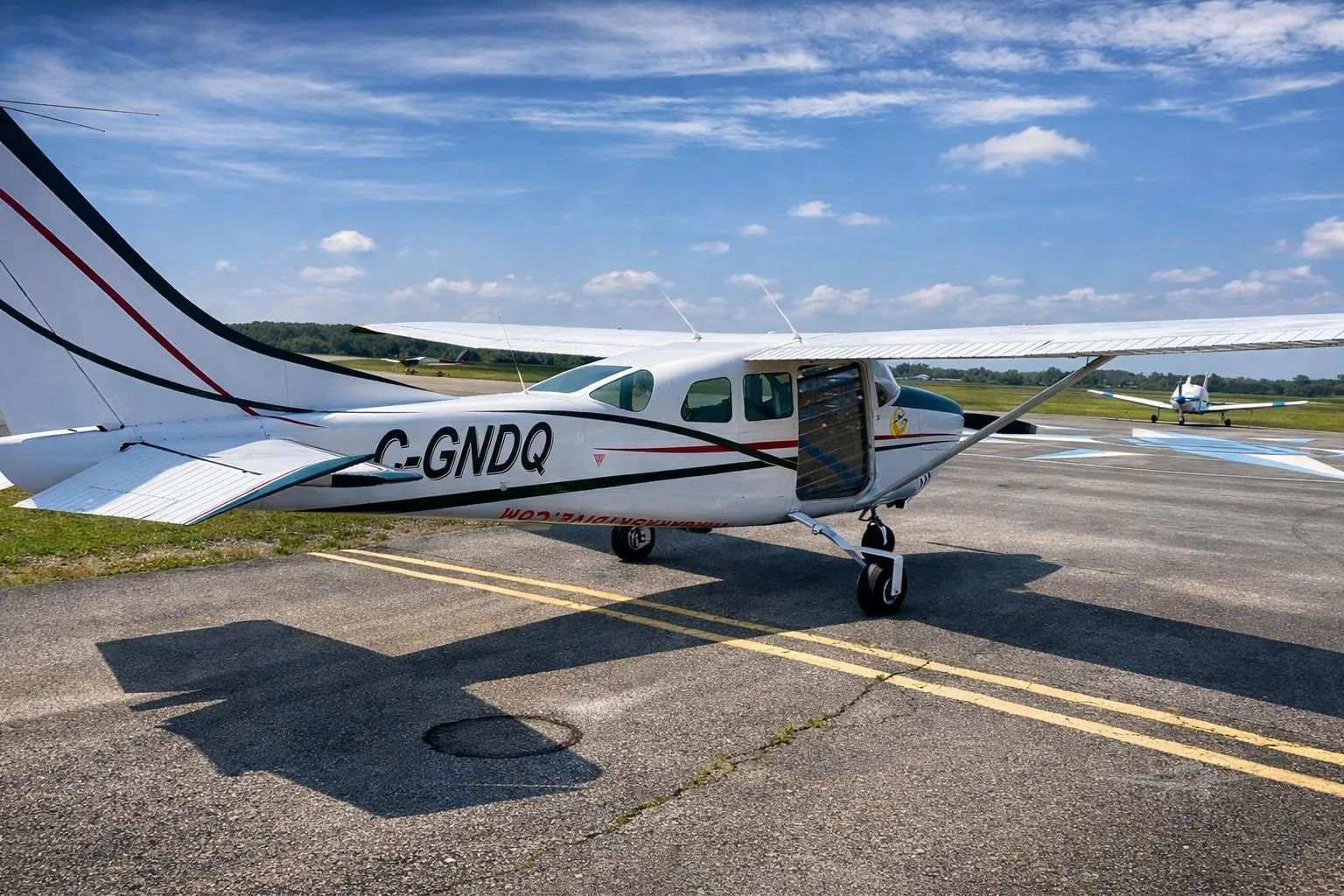 Exterior view of a 1963 CESSNA 205, C-GNDQ.
