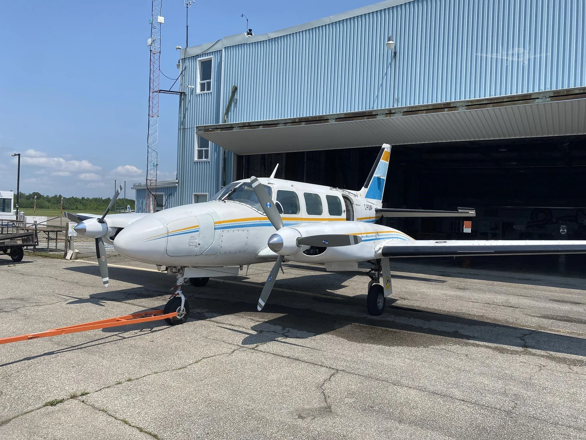 Exterior view of a 1974 PIPER NAVAJO, C-FQWP.