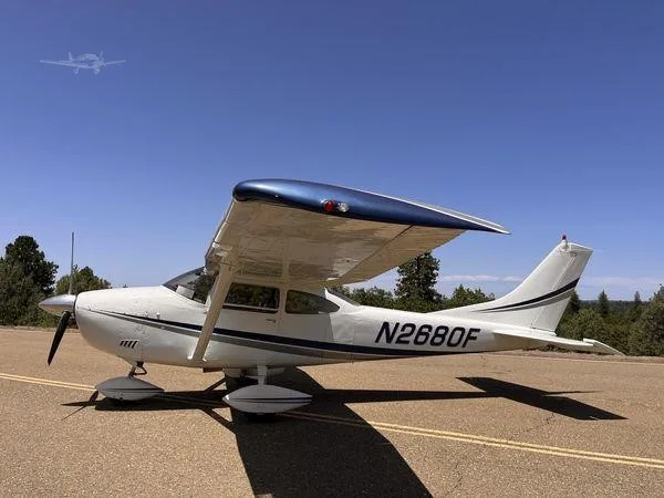 Exterior view of a 1966 CESSNA 182 SKYLANE, N2680F.