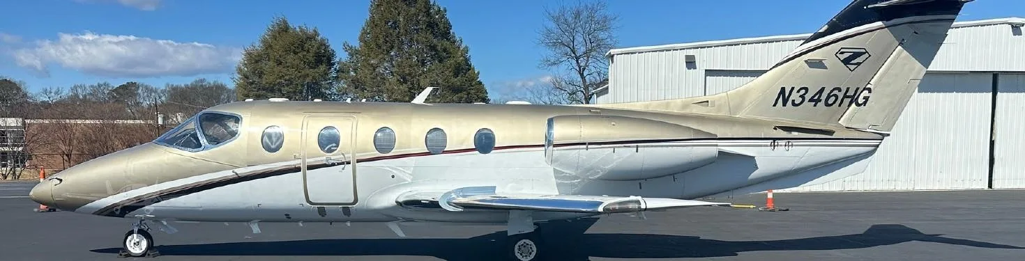 Exterior view of a 2014 NEXTANT 400XTI, N346HG.