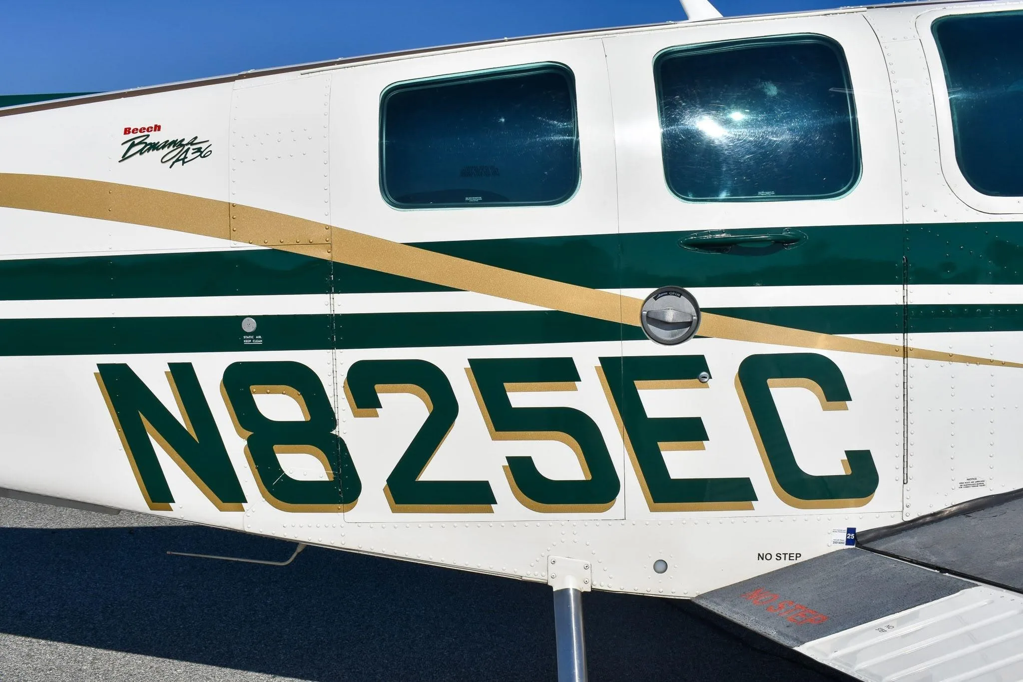 Exterior view of a 1999 BEECHCRAFT A36 BONANZA, N825EC.