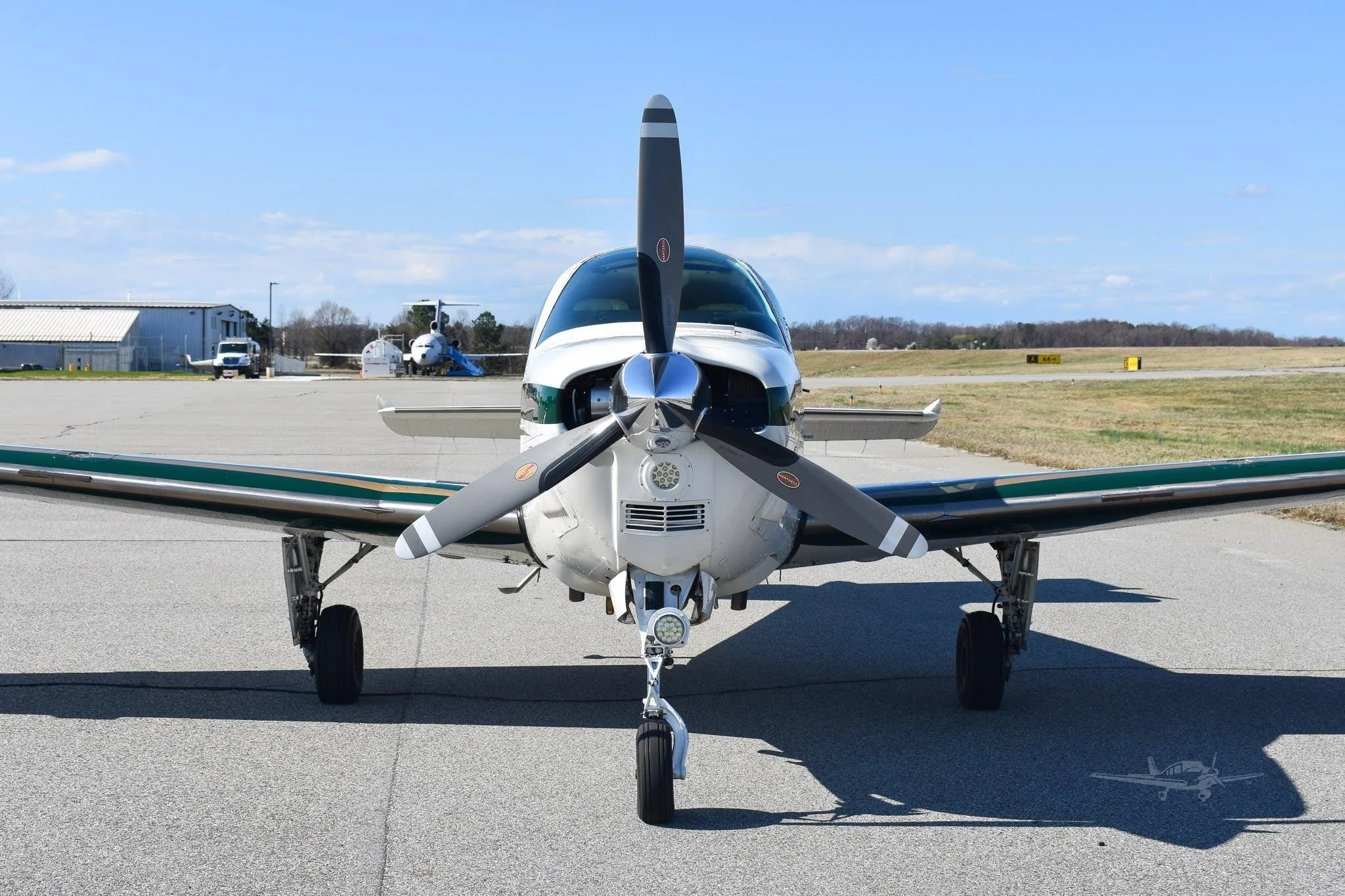 Exterior view of a 1999 BEECHCRAFT A36 BONANZA, N825EC.