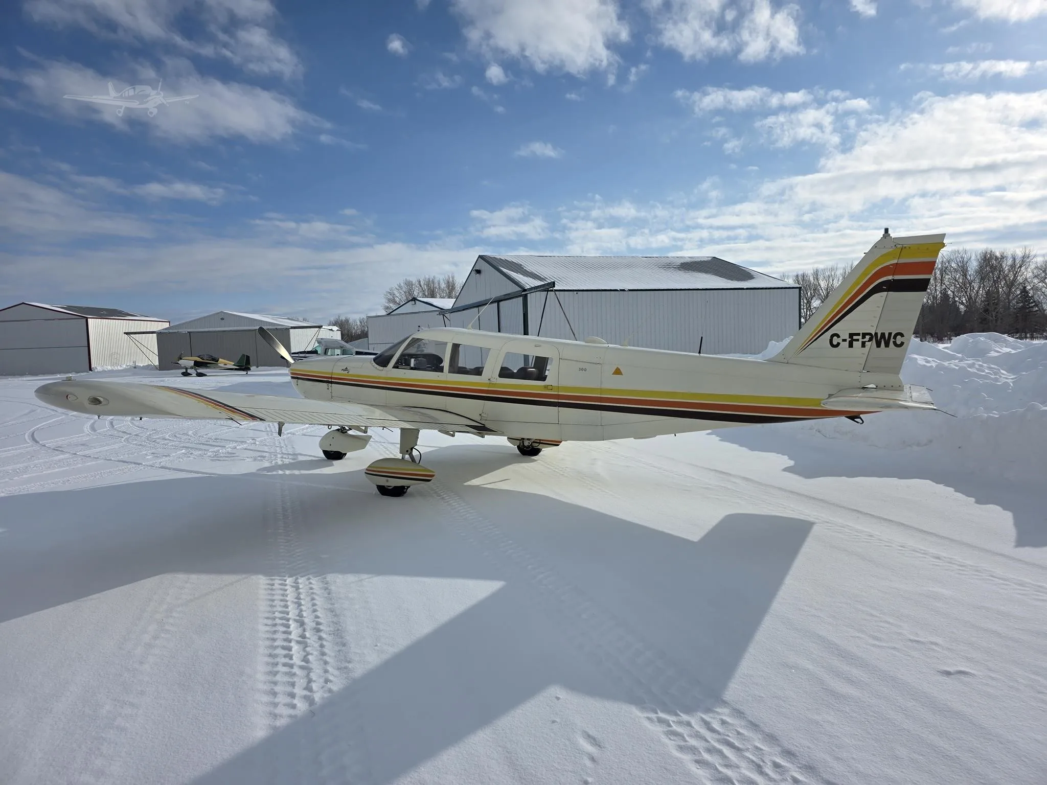 Exterior view of a 1967 PIPER CHEROKEE 6/300, C-FPWC.