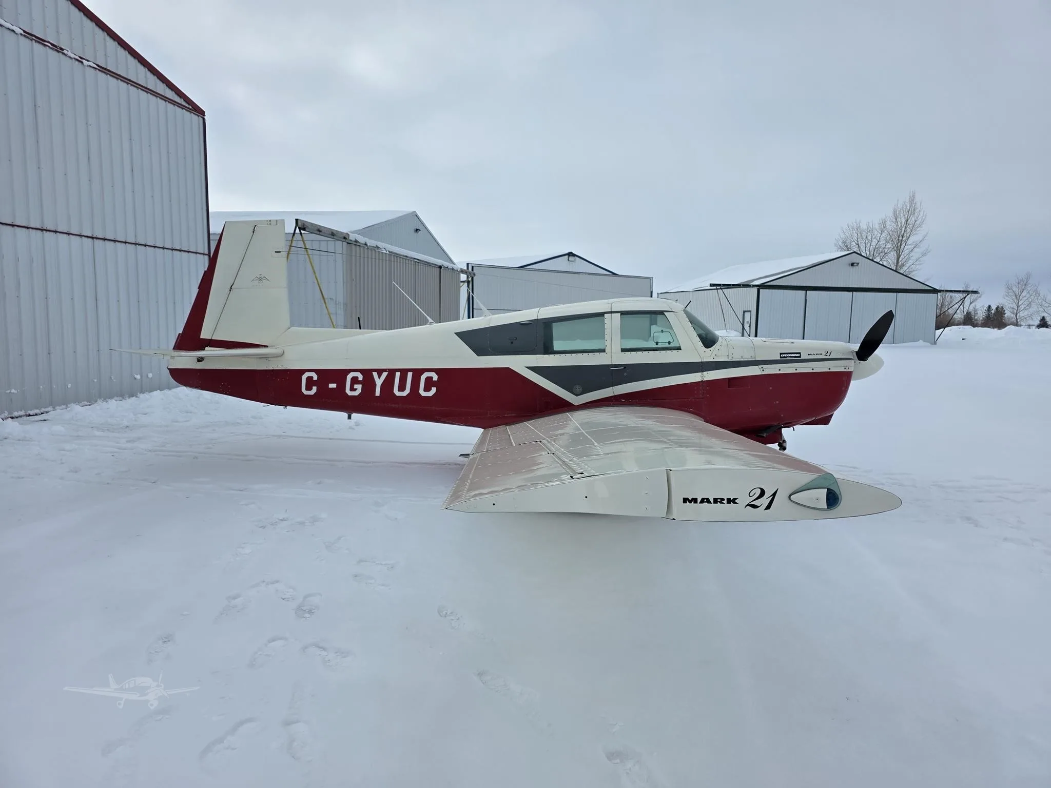 Exterior view of a 1966 MOONEY M20C MARK 21, C-GYUC.