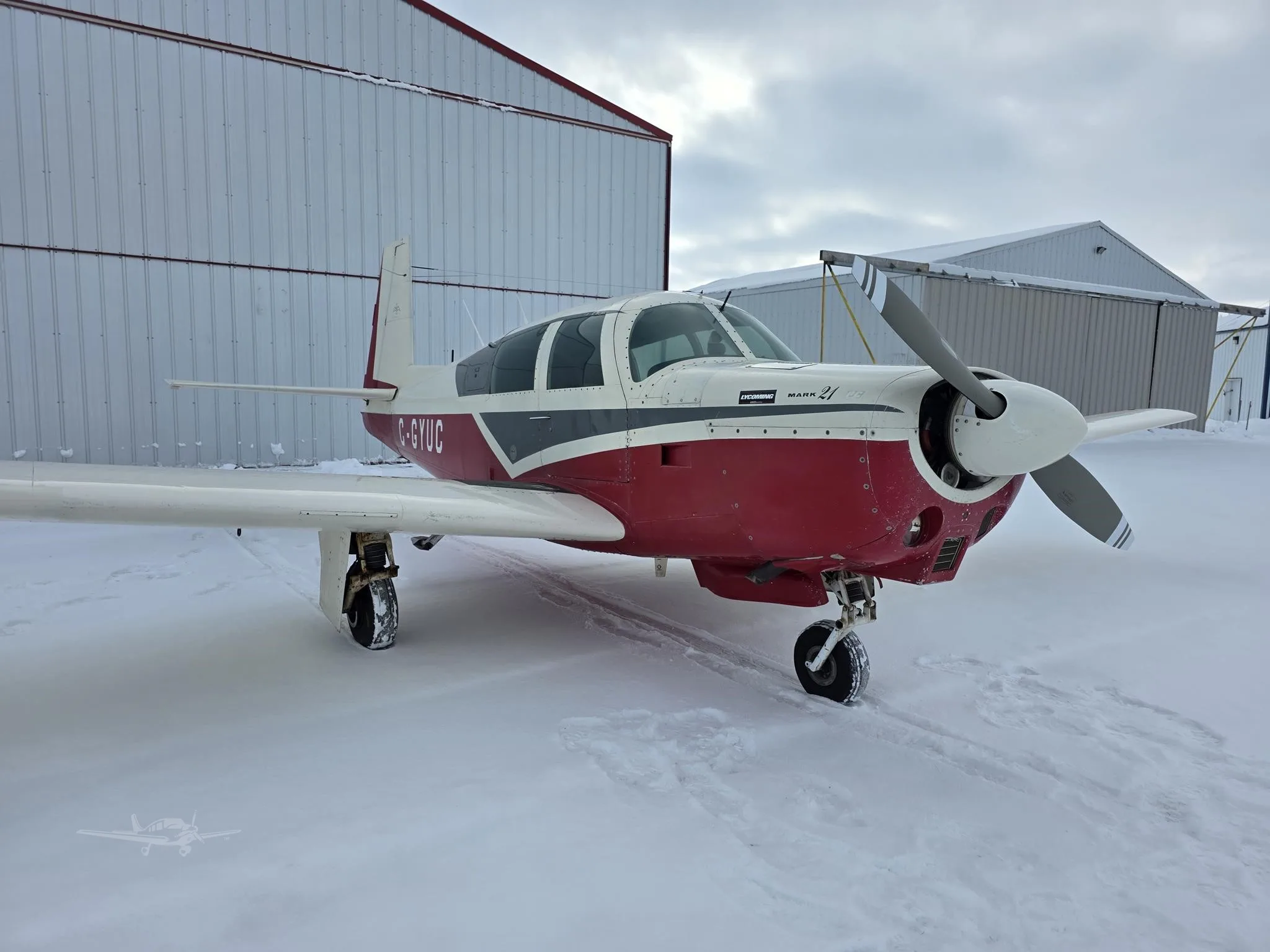 Exterior view of a 1966 MOONEY M20C MARK 21, C-GYUC.