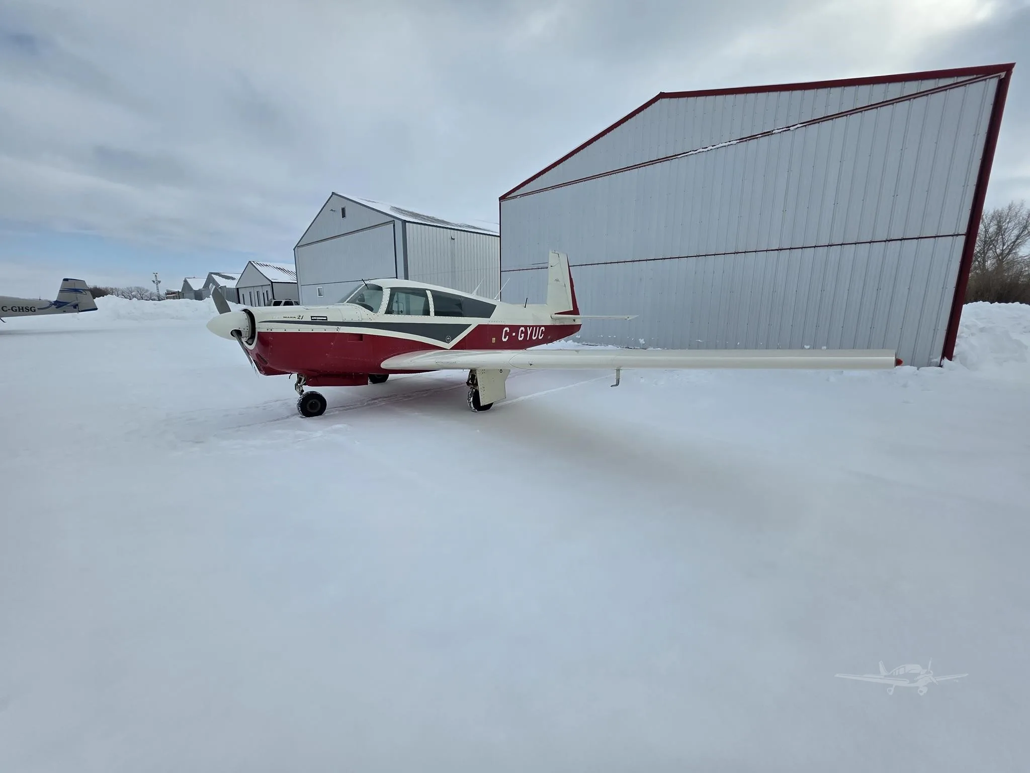 Exterior view of a 1966 MOONEY M20C MARK 21, C-GYUC.