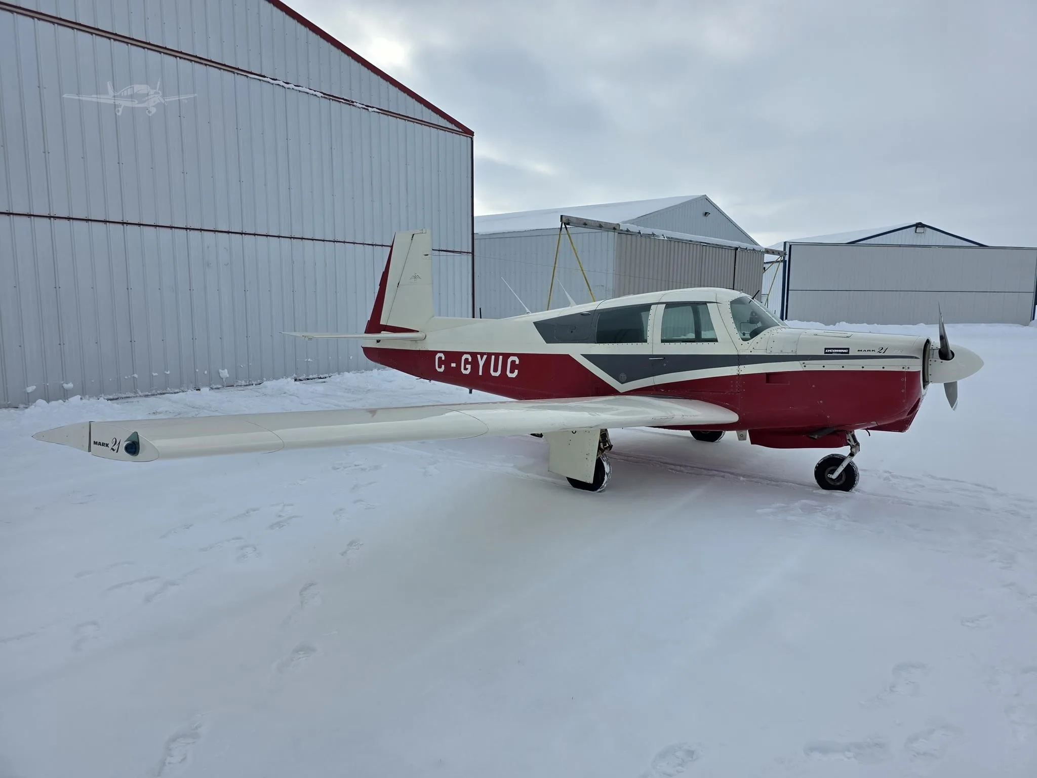 Exterior view of a 1966 MOONEY M20C MARK 21, C-GYUC.