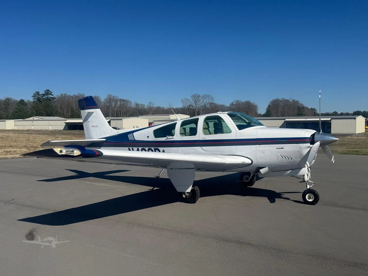 Exterior view of a 1994 BEECHCRAFT F33A BONANZA, N469P.