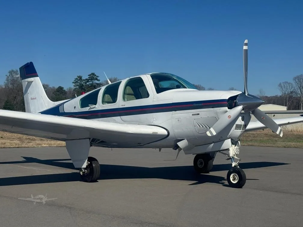 Exterior view of a 1994 BEECHCRAFT F33A BONANZA, N469P.