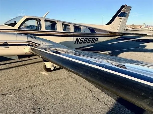 Exterior view of a 1984 BEECHCRAFT 58P BARON, N5858P.