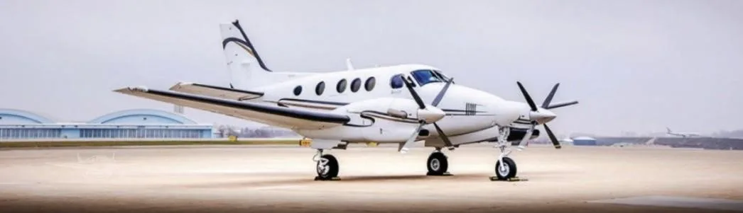 Exterior view of a 2005 BEECHCRAFT KING AIR C90B, N140H.