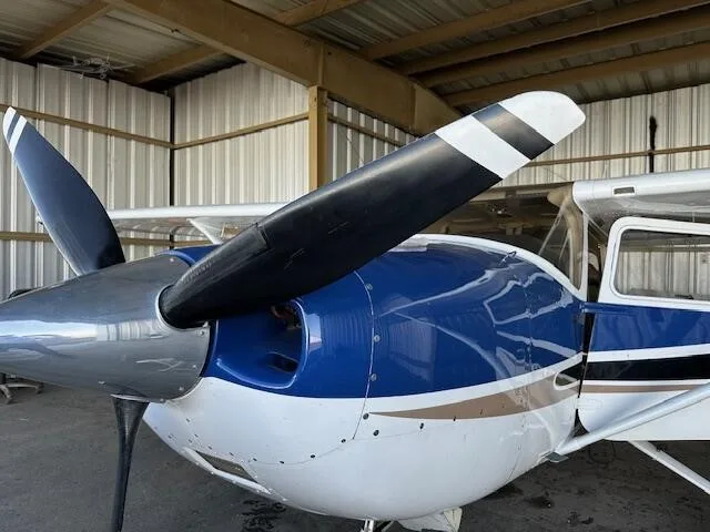 Exterior view of a 2004 CESSNA TURBO 182T SKYLANE, N877VC.