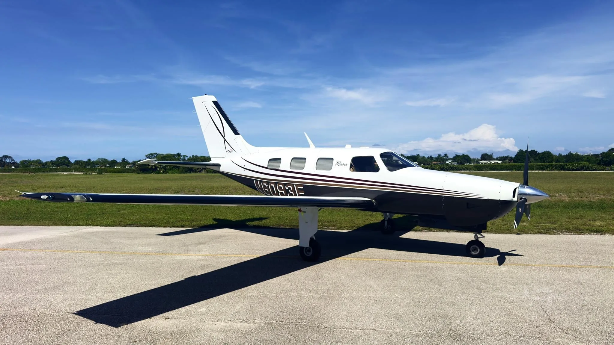Exterior view of a 2010 PIPER MALIBU MATRIX, N6093E.