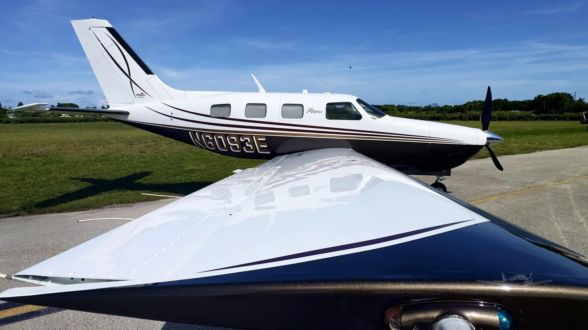 Exterior view of a 2010 PIPER MALIBU MATRIX, N6093E.