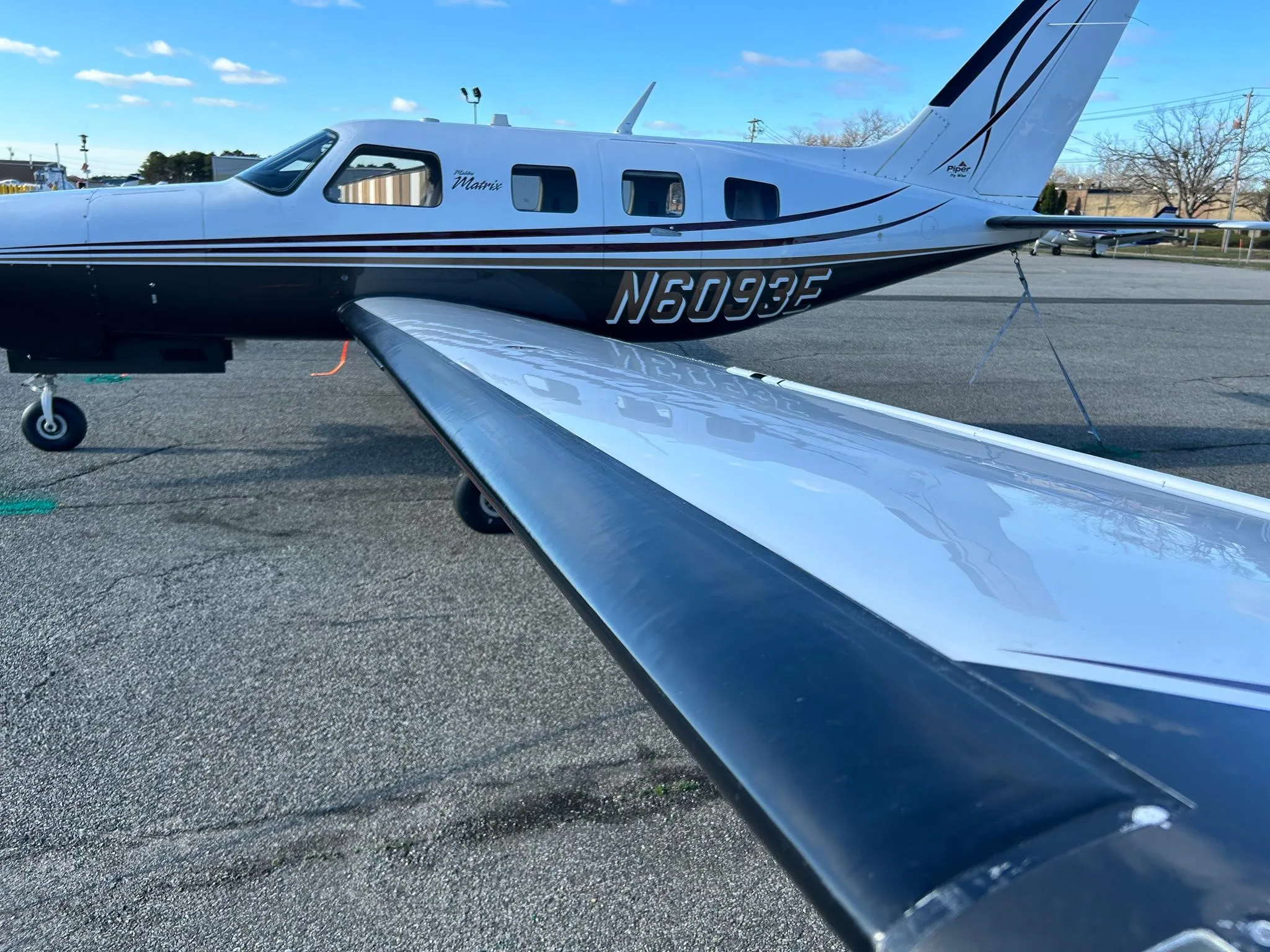 Exterior view of a 2010 PIPER MALIBU MATRIX, N6093E.