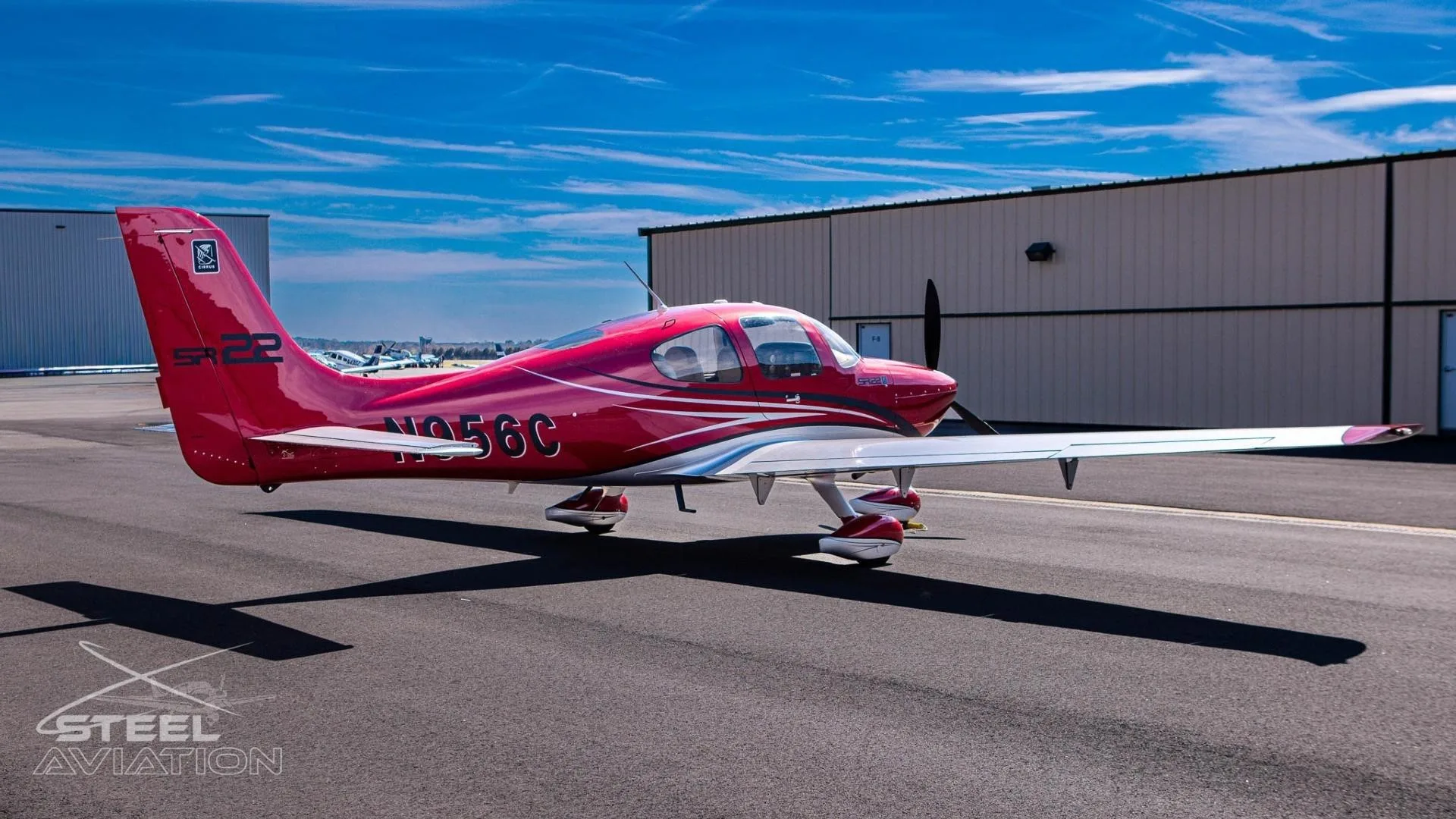 Exterior view of a 2002 CIRRUS SR22, N956C.