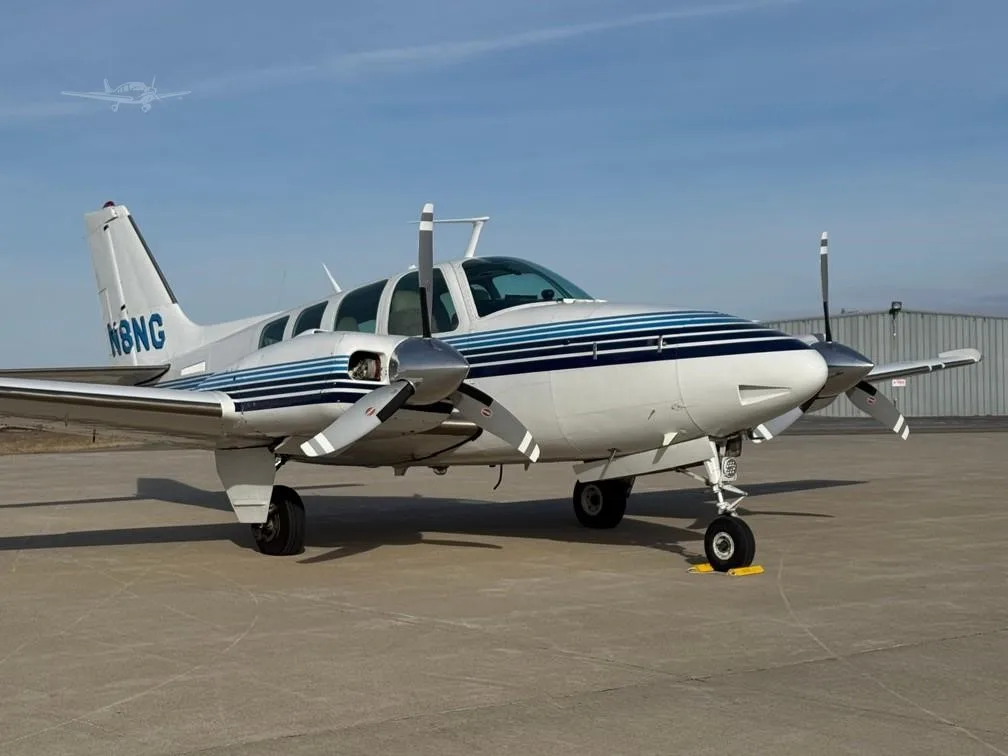 Exterior view of a 1970 BEECHCRAFT 58 BARON, N8NG.