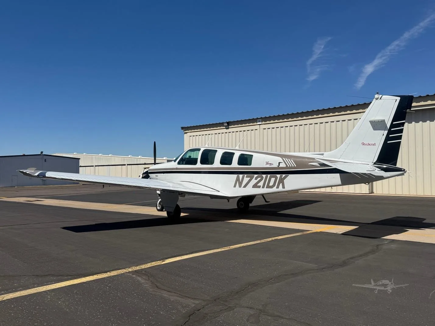 Exterior view of a 1997 BEECHCRAFT A36 BONANZA, N721DK.