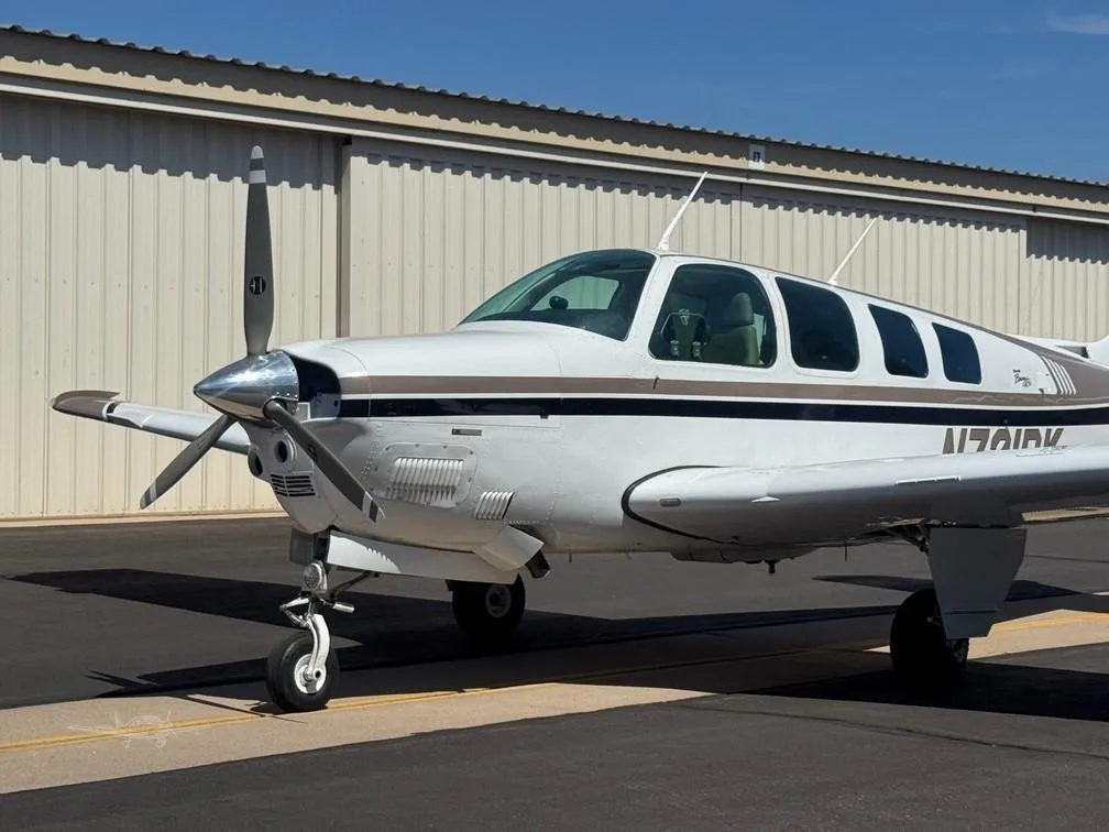 Exterior view of a 1997 BEECHCRAFT A36 BONANZA, N721DK.