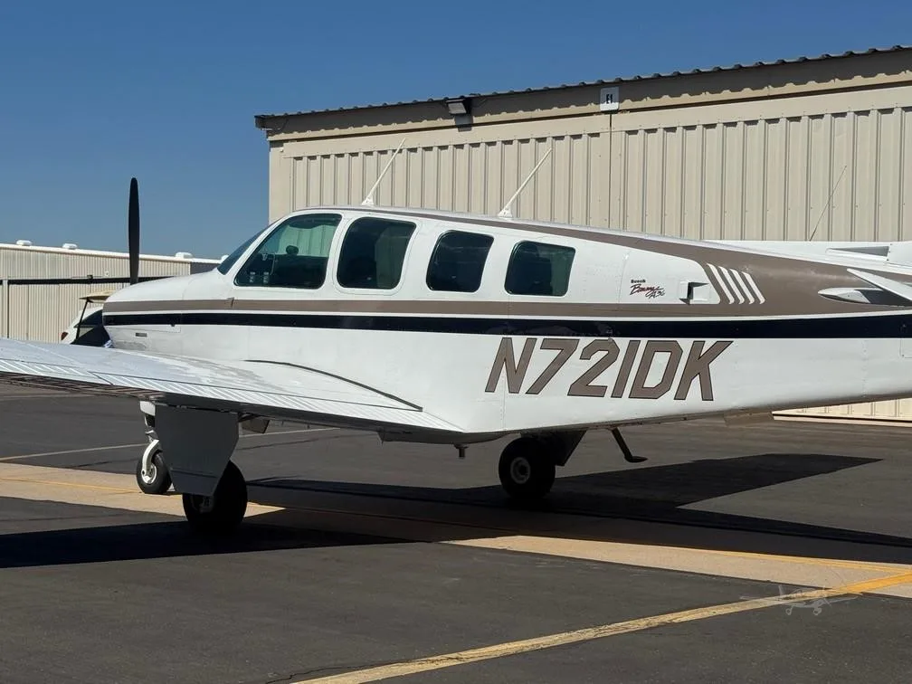 Exterior view of a 1997 BEECHCRAFT A36 BONANZA, N721DK.