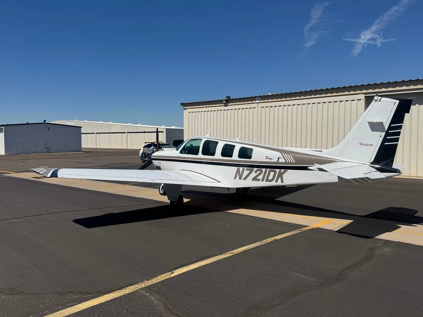 Exterior view of a 1997 BEECHCRAFT A36 BONANZA, N721DK.