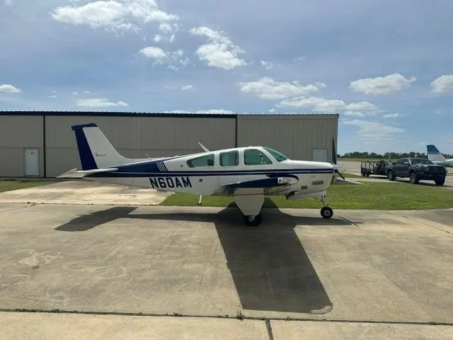 Exterior view of a 1978 BEECHCRAFT F33A BONANZA, N60AM.
