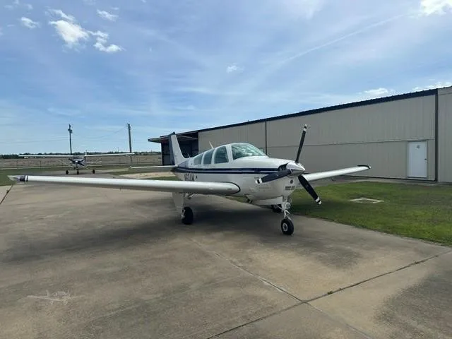 Exterior view of a 1978 BEECHCRAFT F33A BONANZA, N60AM.