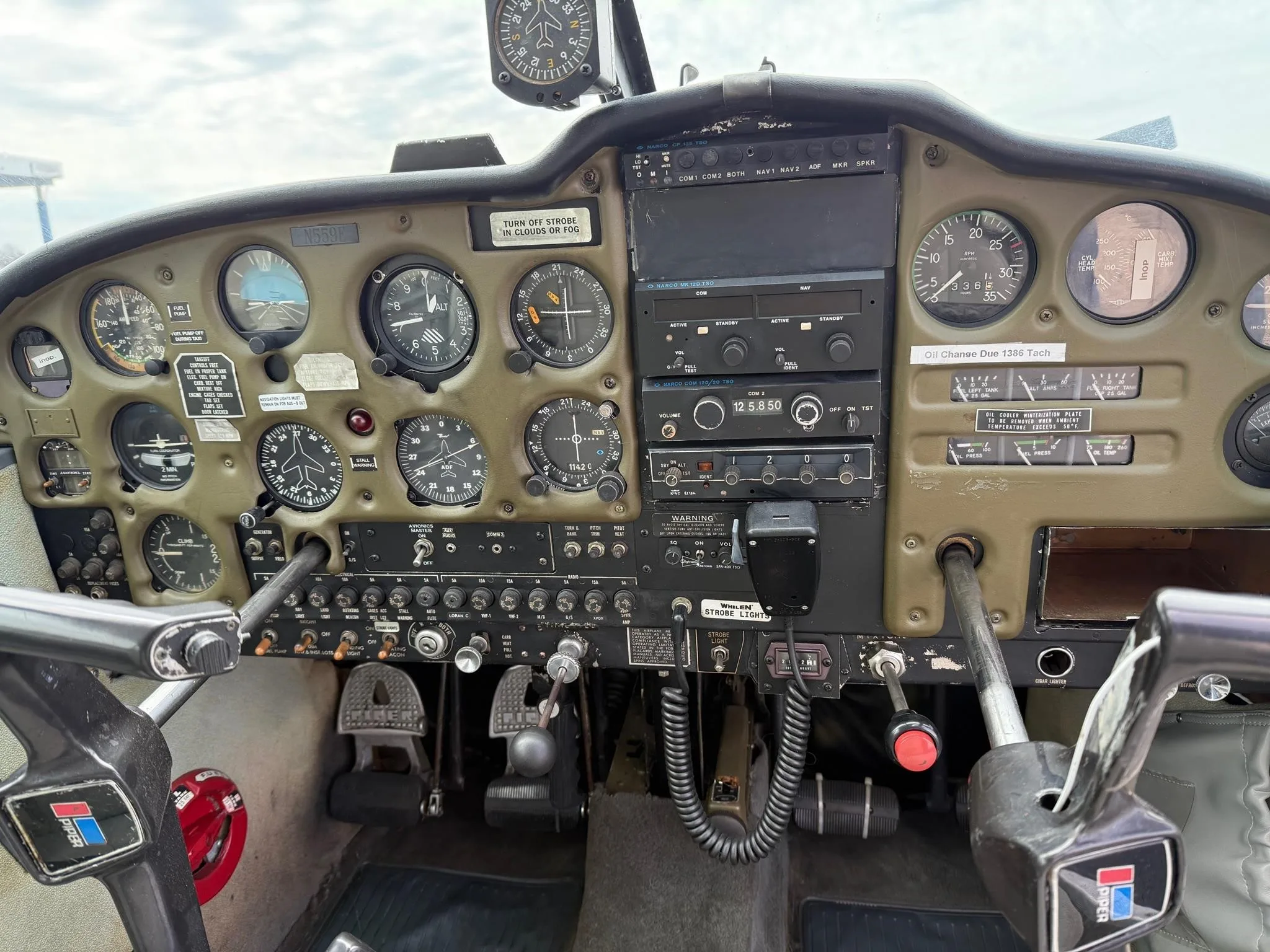 Cockpit and instrument panel of a 1966 PIPER CHEROKEE 180.