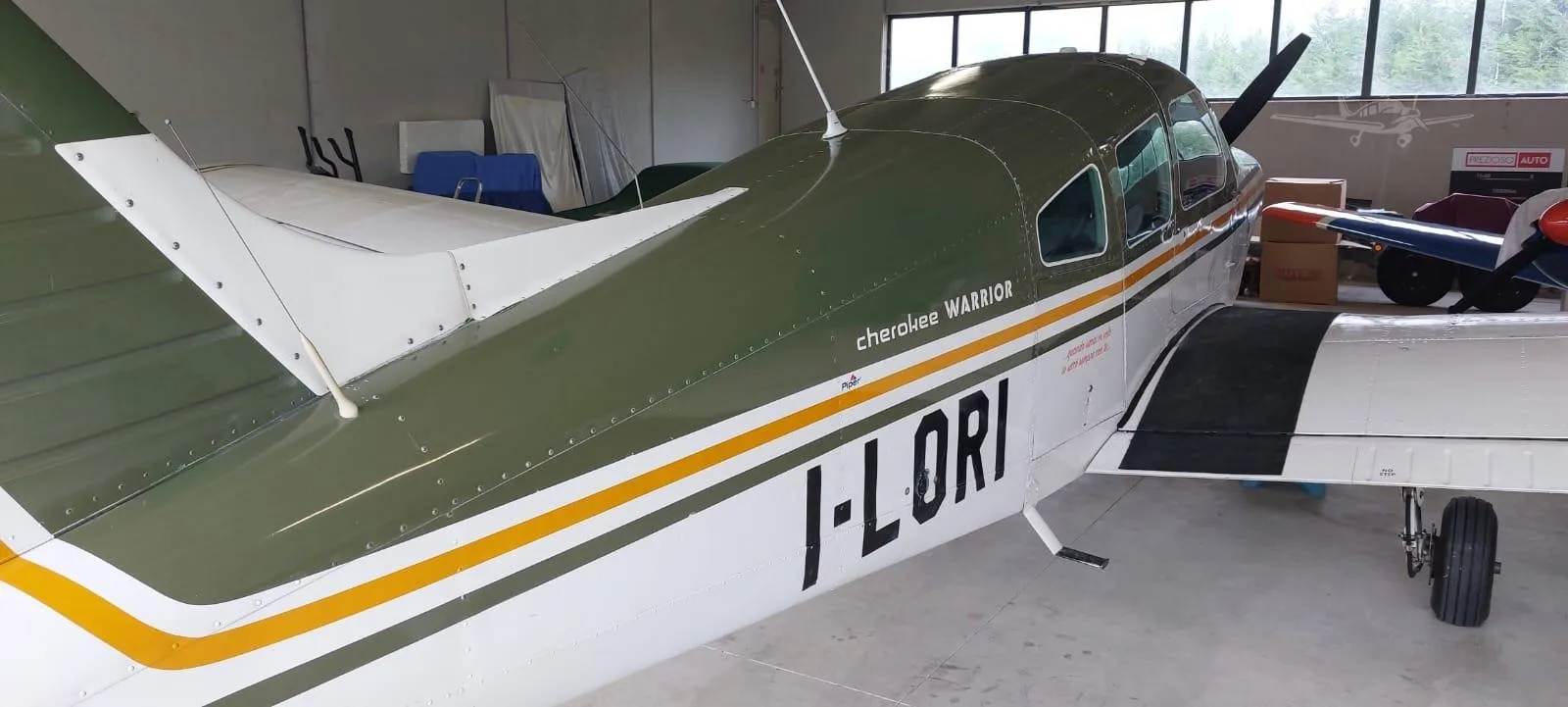 Exterior view of a 1974 PIPER WARRIOR, I-LORI.