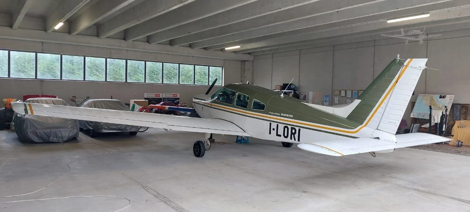 Exterior view of a 1974 PIPER WARRIOR, I-LORI.