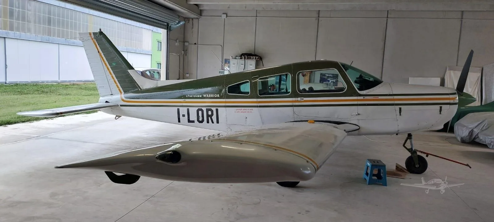 Exterior view of a 1974 PIPER WARRIOR, I-LORI.