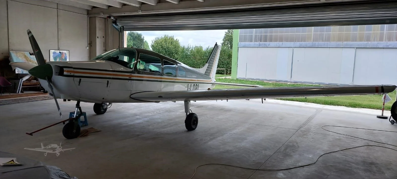 Exterior view of a 1974 PIPER WARRIOR, I-LORI.