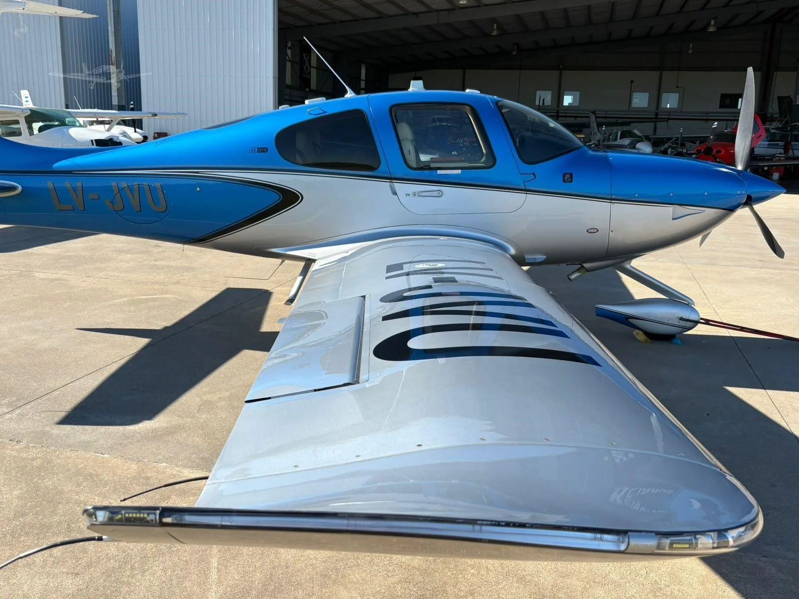 Exterior view of a 2021 CIRRUS SR22-G6, LV-JVU.