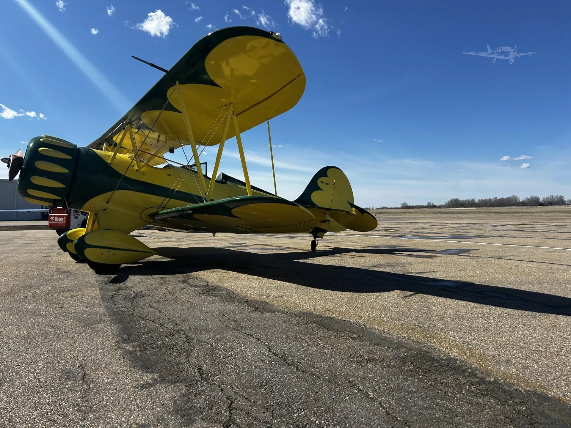 Exterior view of a 2000 WACO YMF-5C, C-FLJT.