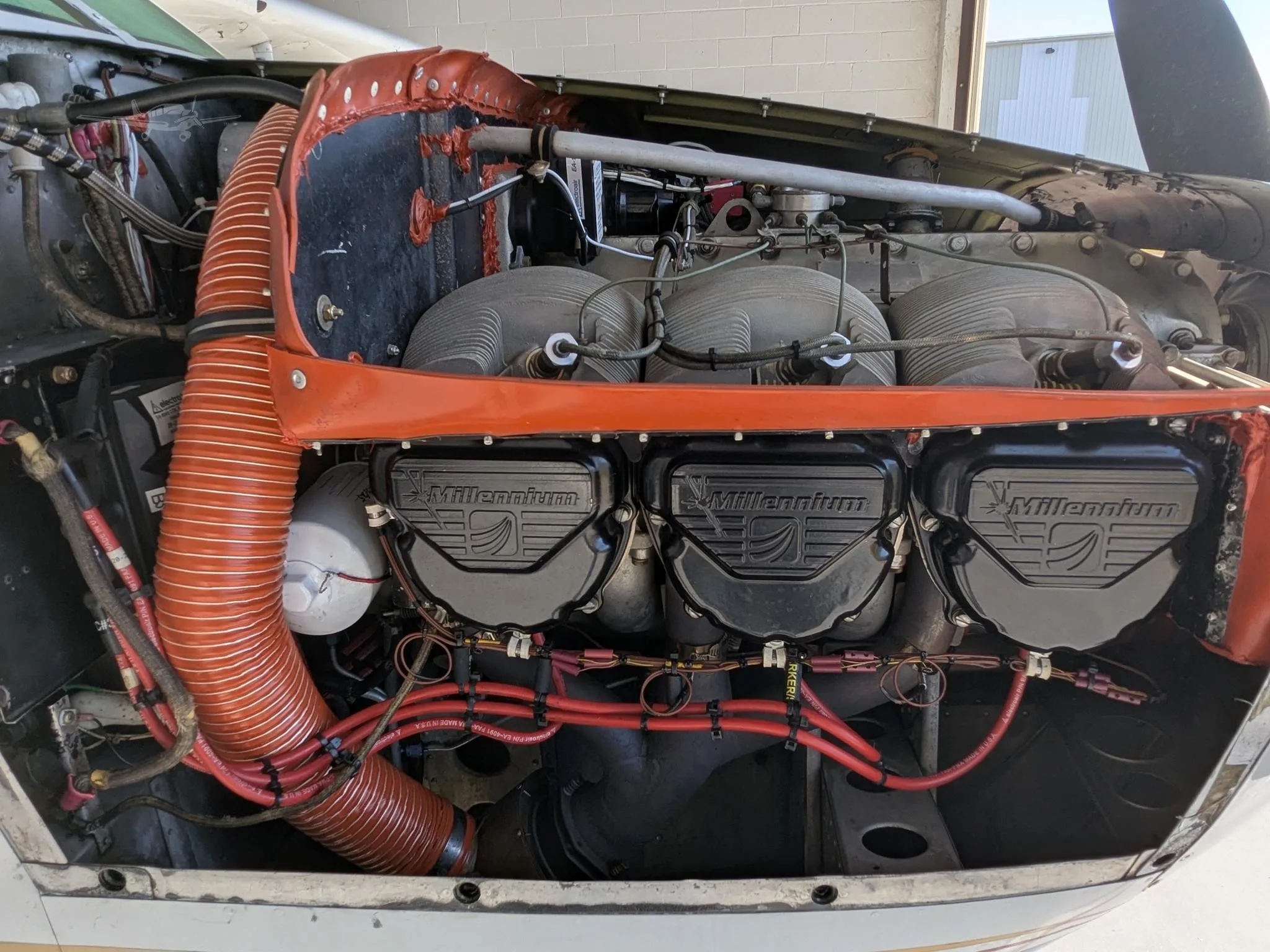 Engine detail of a 1962 CESSNA 210.