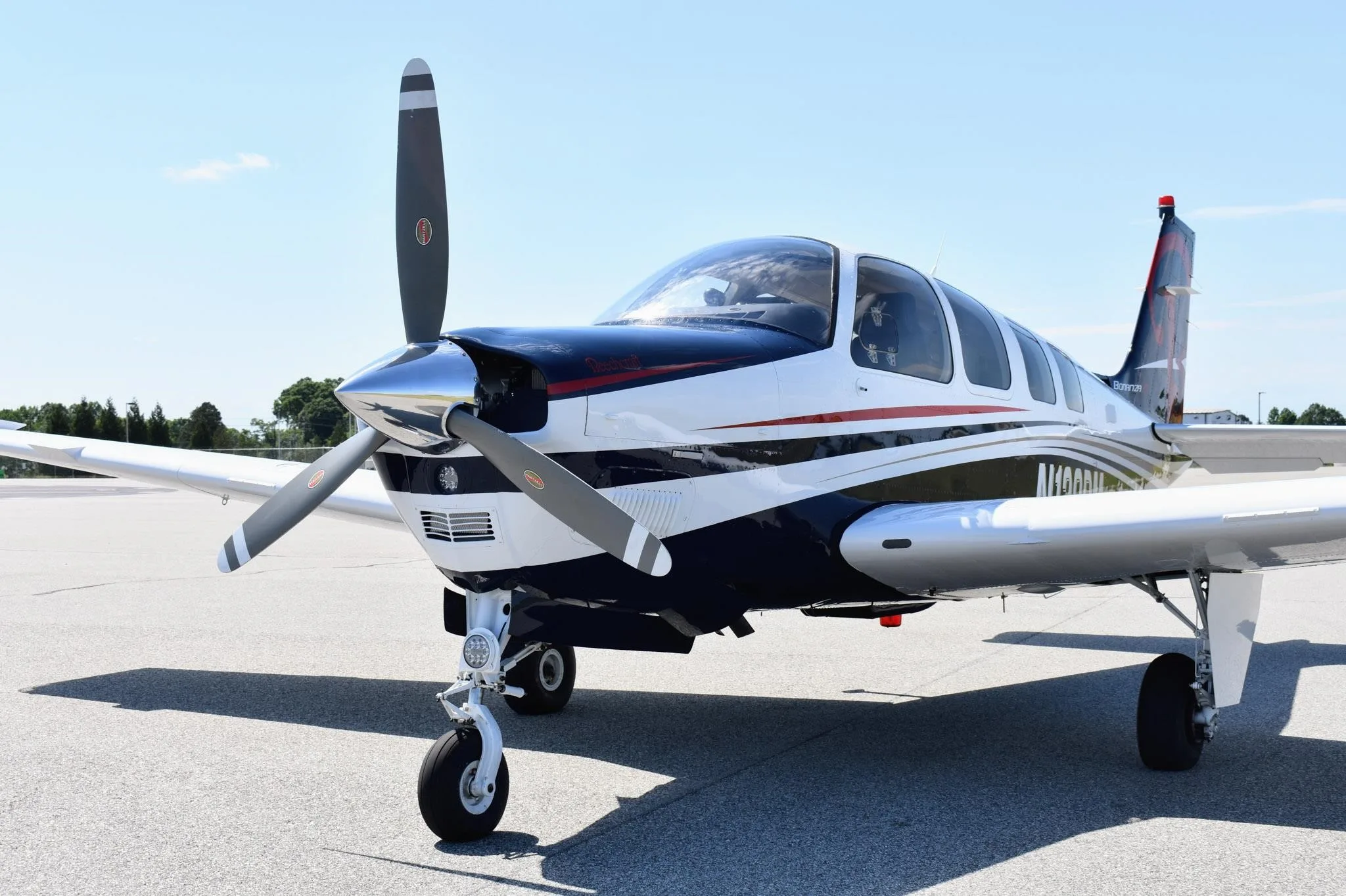 Exterior view of a 2005 BEECHCRAFT A36 BONANZA, N129BM.